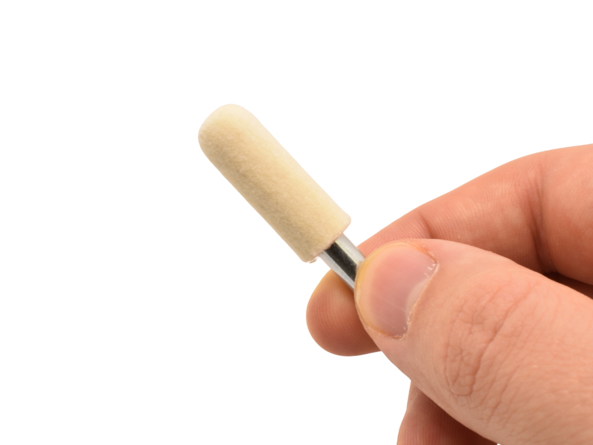 Small RODA mounted felt bob held between fingers to show scale