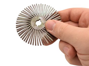 Dedeco Sunburst 3 inch TA radial disc held by hand to show scale and centre hole