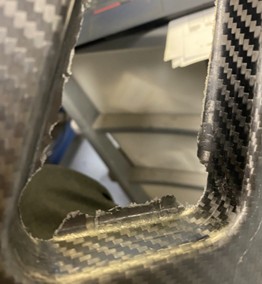 Heavy burr on composite part before removal with a diamond point