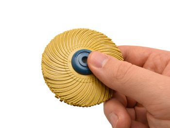 3-inch Dedeco Sunburst TC 6-ply radial wheel held in a hand for scale