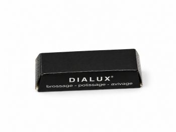 Dialux Black polishing compound bar in black packaging on a white background.