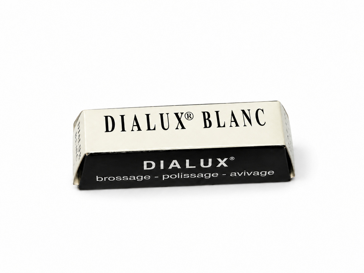 Dialux Blanc white polishing compound bar in white and black packaging on a white background.