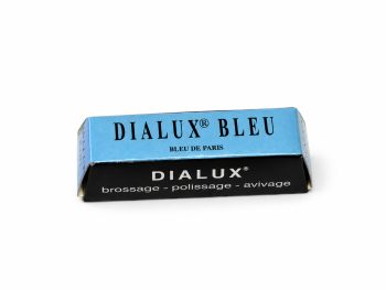Dialux Bleu blue polishing compound bar in blue and black packaging on a white background.