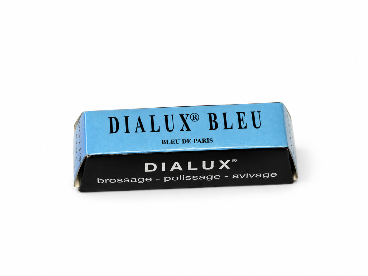Dialux Bleu blue polishing compound bar in blue and black packaging on a white background.