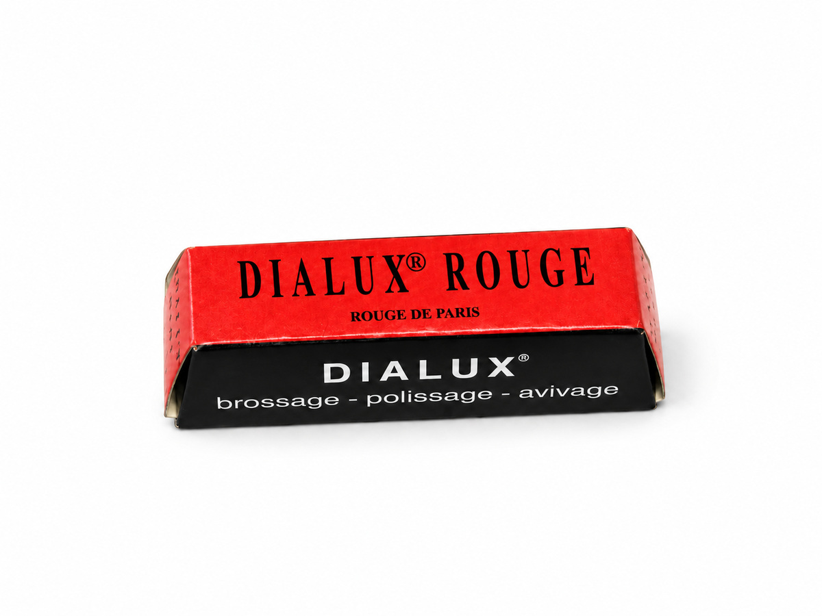 Dialux Rouge red polishing compound bar in red and black packaging on a white background.