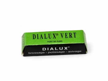 Dialux Vert green polishing compound bar in green and black packaging on a white background.