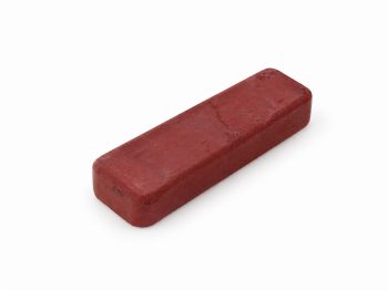 Small 4 x 1 inch rouge Starmax polishing compound bar on a white background.