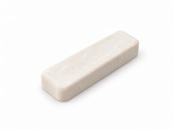 Small 4 x 1 inch white Mirrormax polishing compound bar on a white background.